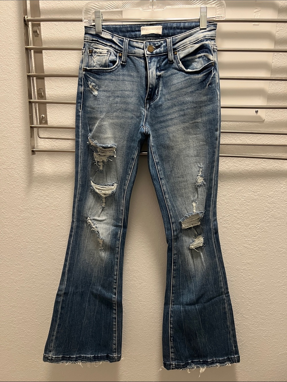 Mid-Rise Distressed Blue Flare Jeans
